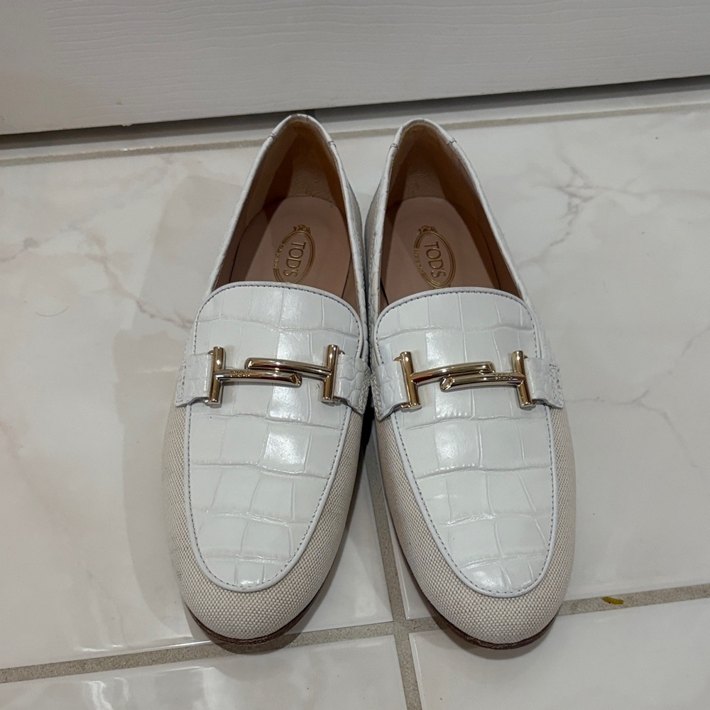 Tod's White Loafers with Gold Buckle